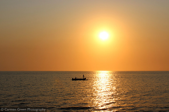 Malagasy sunset with local fishermen
