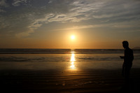 Sunset and waders at Pismo Beach California